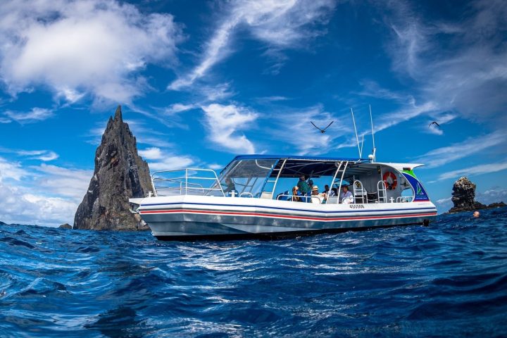 a small boat in a body of water