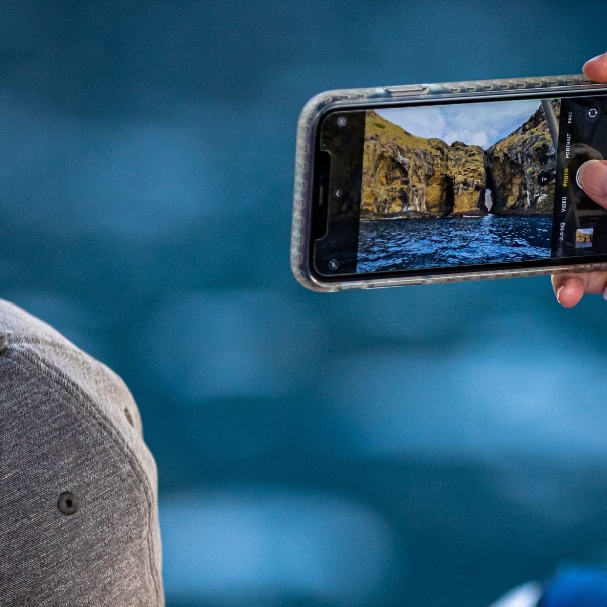 a hand holding a cellphone