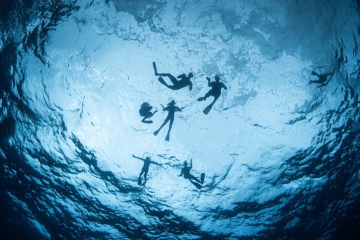 a person that is standing in the snow