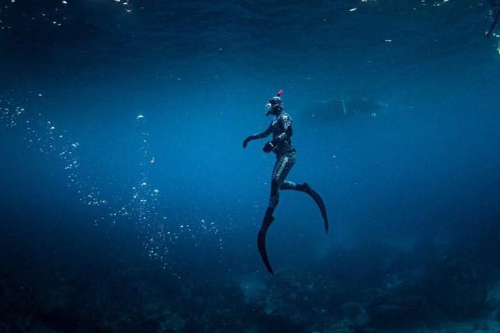 a man swimming in the water