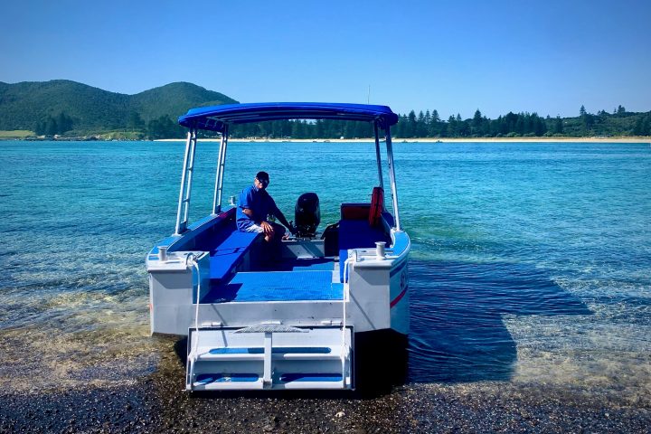 a small boat in a body of water