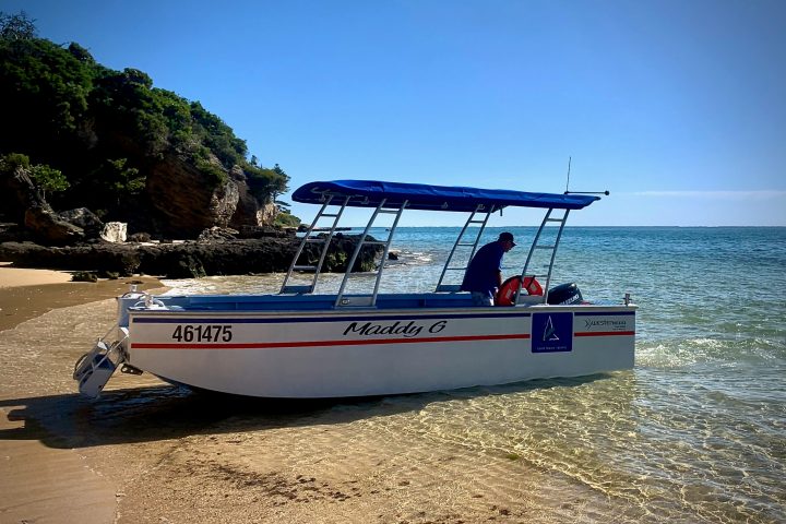 a small boat in a body of water