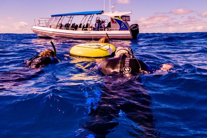 a small boat in a body of water